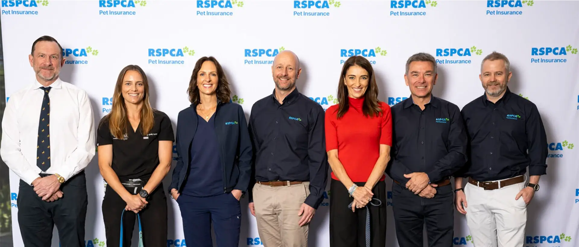 Members of the launch panel in front of RSPCA Pet Insurance logos